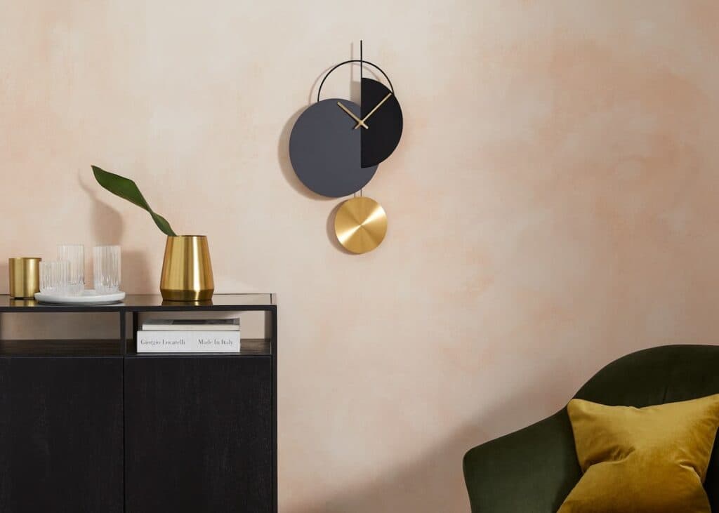 décoration murale ronde laiton métal noir salon