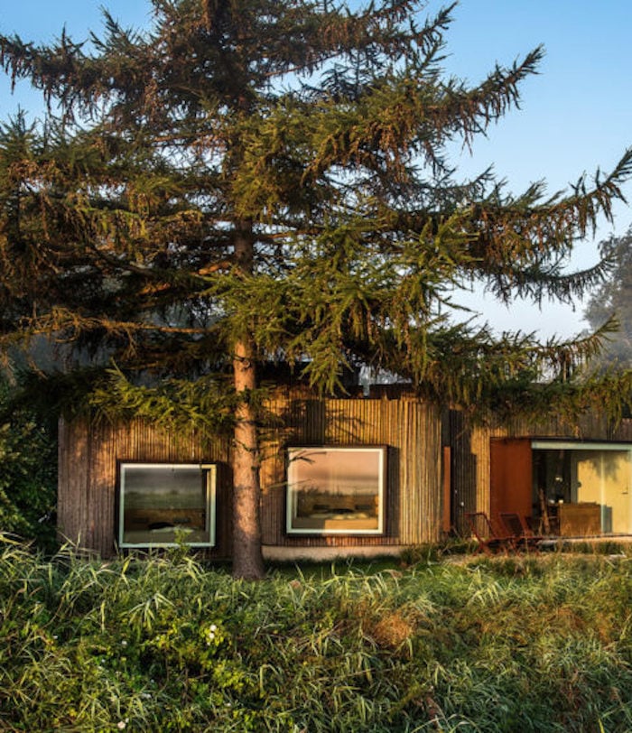 maison ronde rondin foret miroir ciel vitre sapin foret