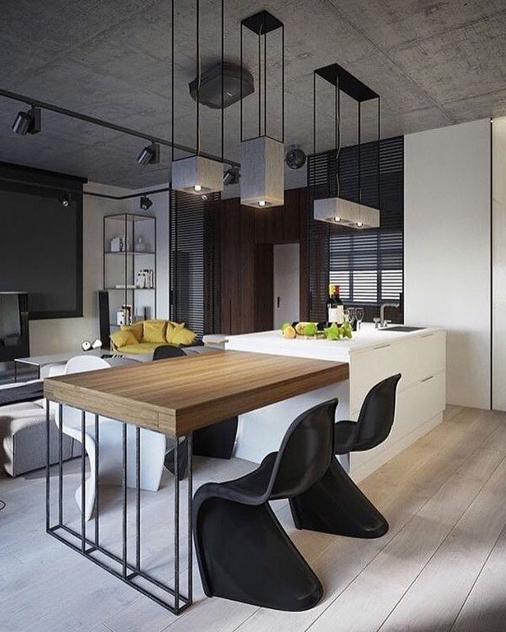 cuisine ouverte style industriel chaise ronde noire table bois déco