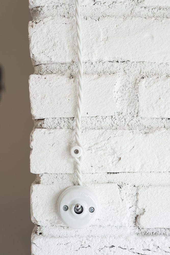 interrupteur retro rond porcelaine pas cher design retro vintage mur briques blanches