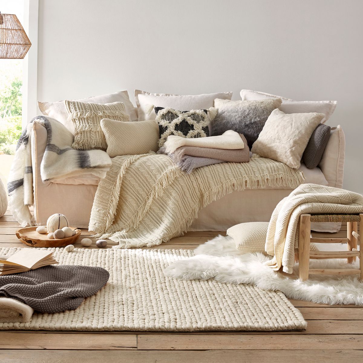 canapé lin multitude plein coussins coton laine mélange salon tendance hiver cocooning design