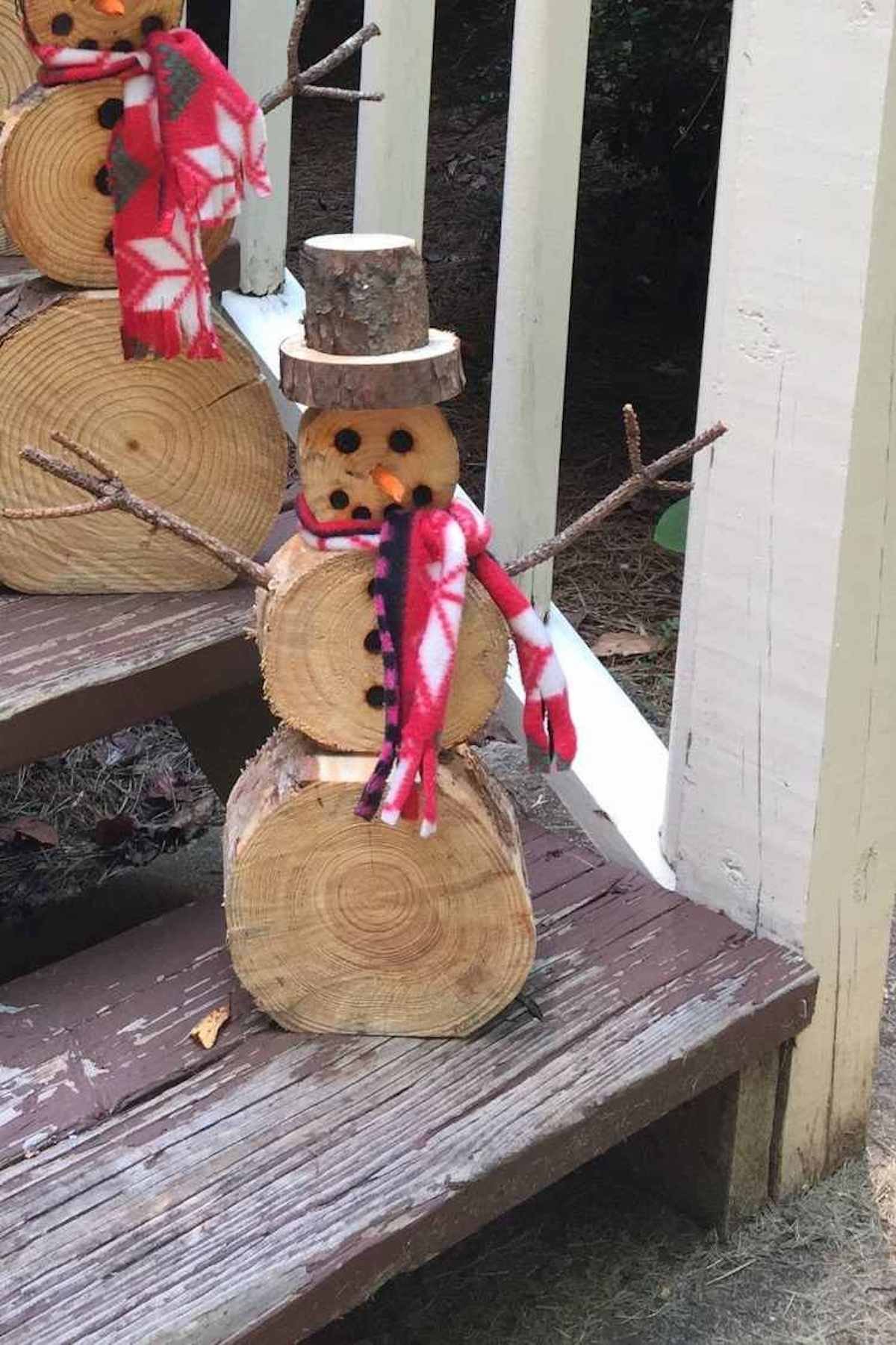 rondin de bois décoration de noël extérieure - blog déco - clematc