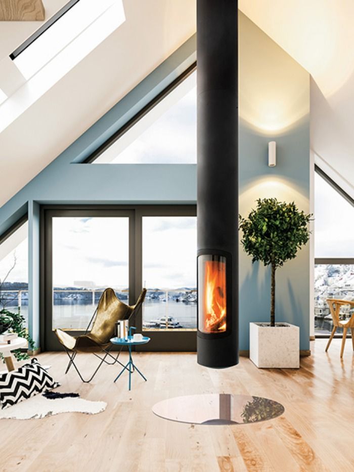 poêle design long oval parquet bois baie vitrée déco contemporaine