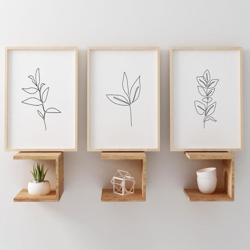 déco murale tableau cadre bois étagère bois claire affiche noir trait fin