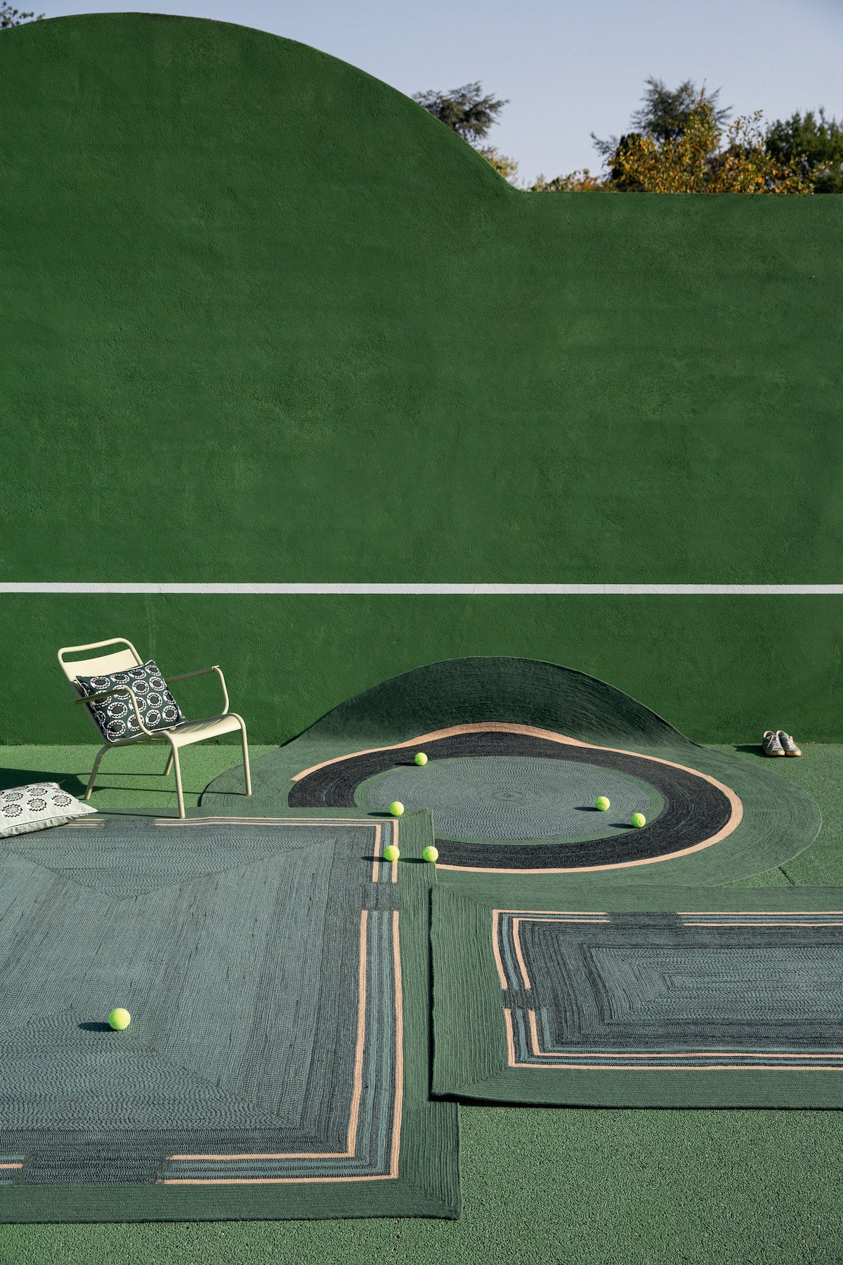 Élitis tapis extérieur rond haut de gamme design français noir beige vert