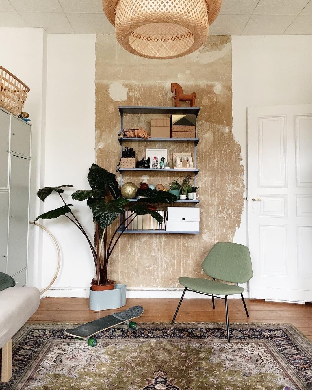 salon tapis vintage délavé suspension cannage