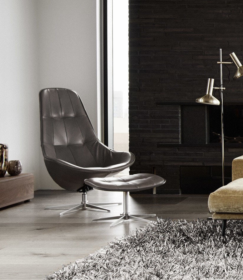 salon moderne fauteuil rond cuir capitonné deco intérieure