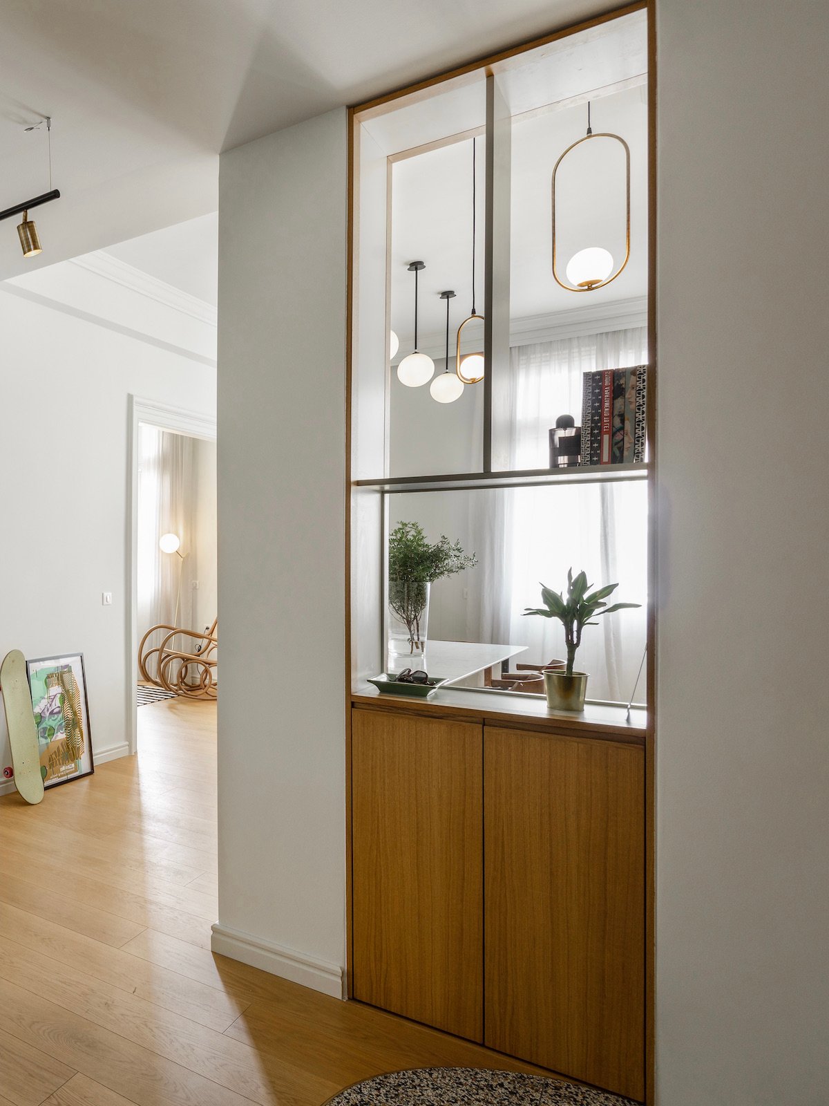 réalisation architecte petite entrée niche ajourée sur séjour