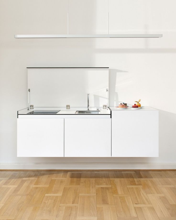 petite cuisine amovible blanche parquet bois