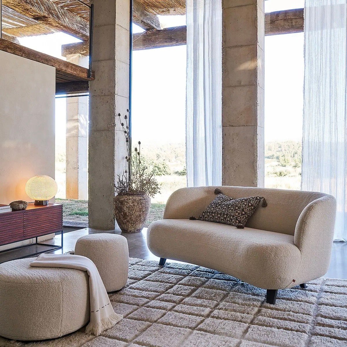 canapé tissu bouclette beige rond ovale courbe