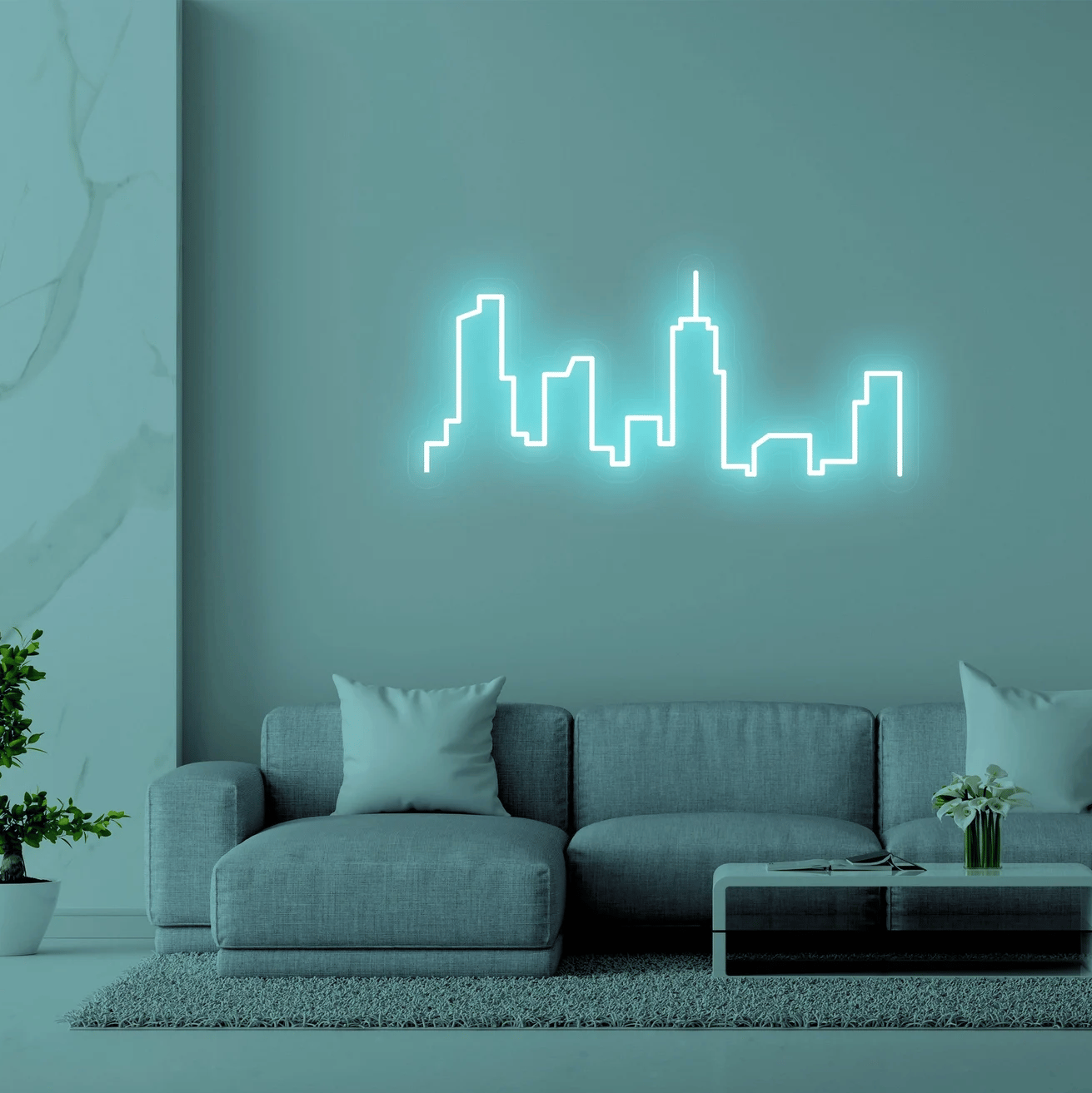 neon mural bleu turquoise salon urbain canapé angle gris plante verte