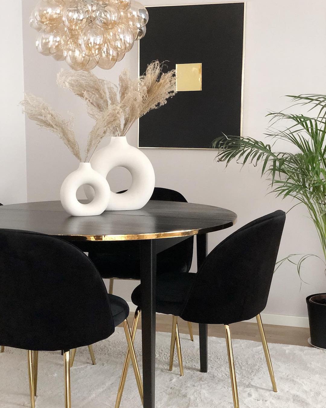 table à manger ronde noire laiton salon élégant