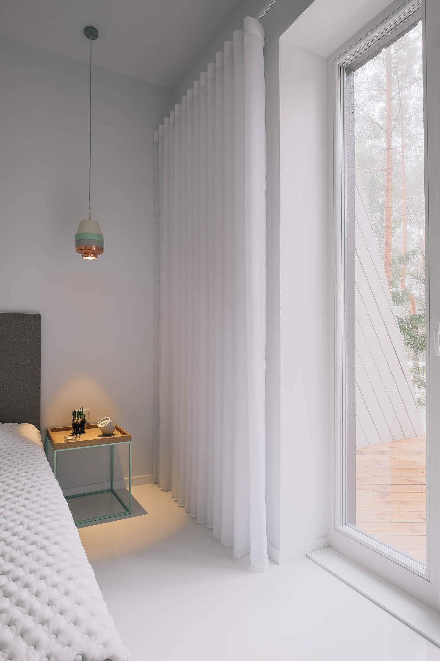 appartement tout blanc chambre forêt