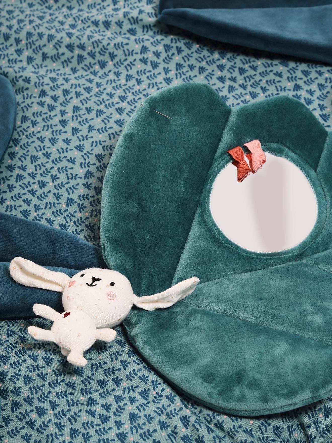 chambre bébé tapis sensoriel miroir bleu canard