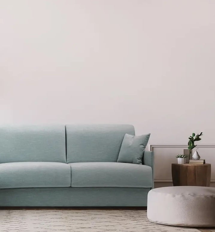 canape bleu clair bois parquet blanc plaid tapis salon lumineux