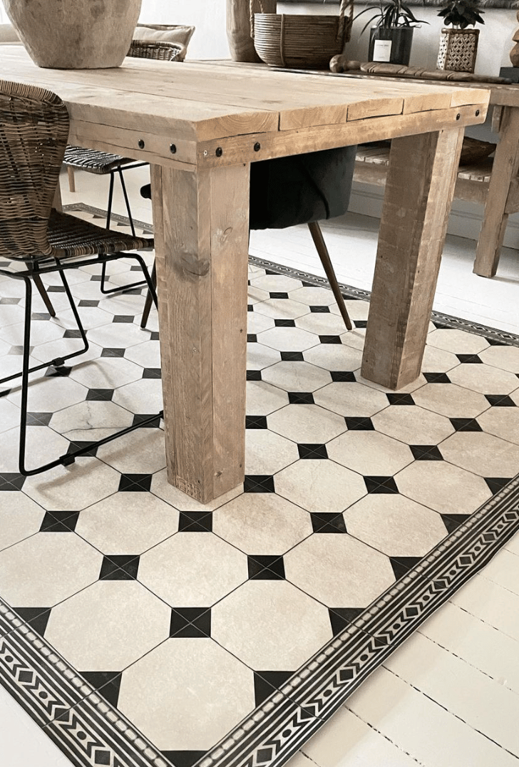 salle a manger table bois brut tapis