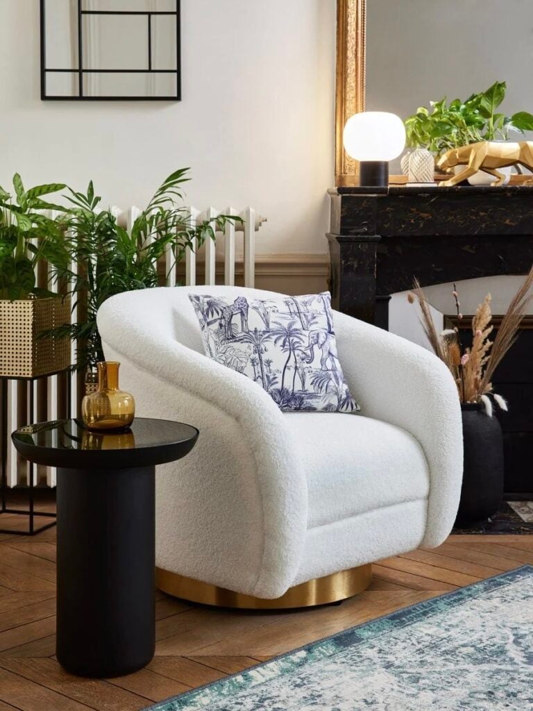 fauteuil bouclette socle laiton pivotant table 60s noire