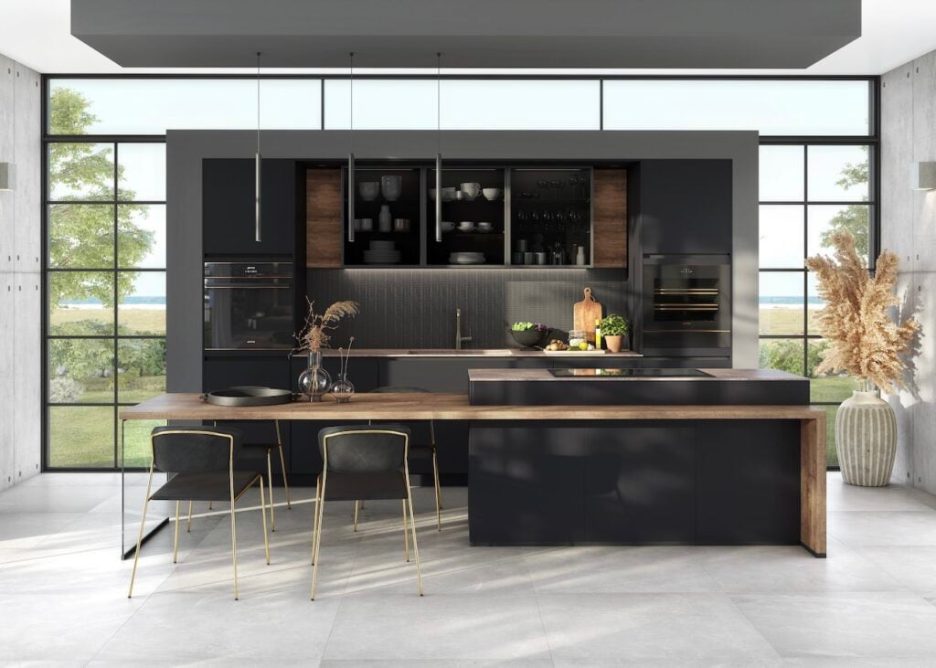 cuisine meublée noire bois détail laiton ilot