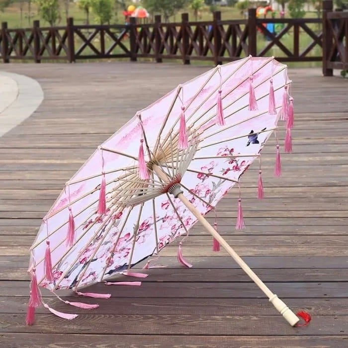 parapluie pompon rose tradition asiatique Japon