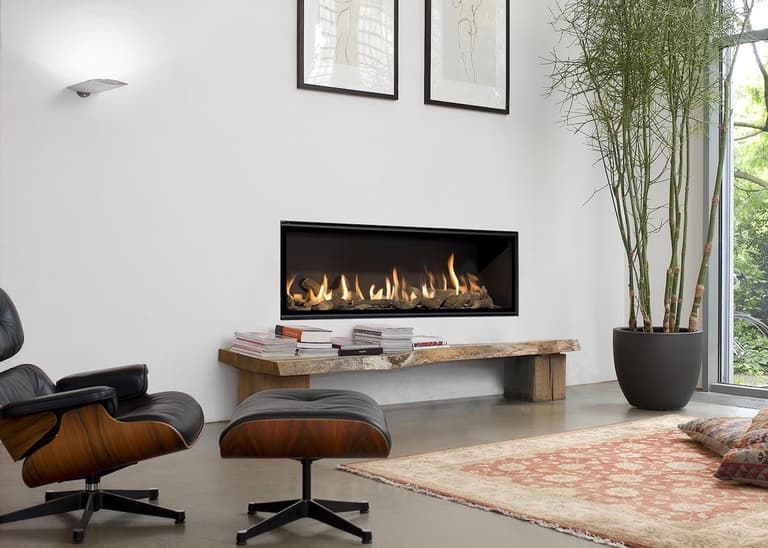 cheminée gaz salon hygge lounge chair eames noir bambou moderne blog déco - clem around the corner