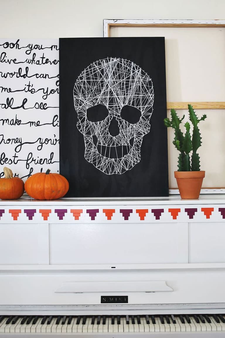décoration murale tissage cordelette panneau tête de mort