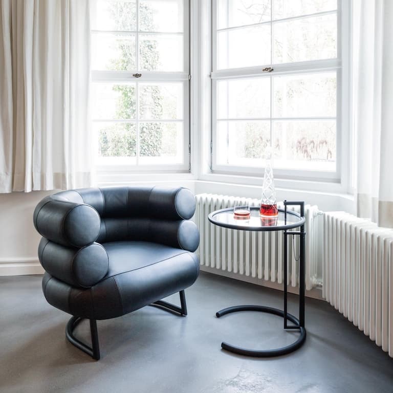 fauteuil design bibendum eileen gray icone design table basse cuir noir - blog déco - clematc