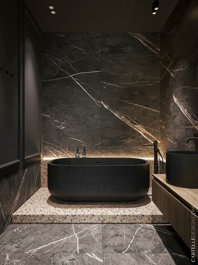 salle de bain noire baignoire ilot marbre noir sol terrazzo rose - clem around the corner