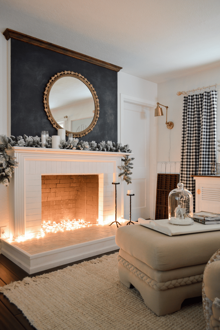 idée déco cheminée condamnée guirlandes lumineuses deco beige crème
