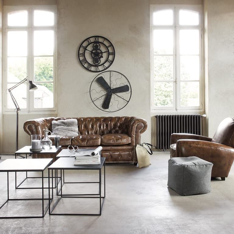 salon lumineux canapé marron cuir table basse design métal noir