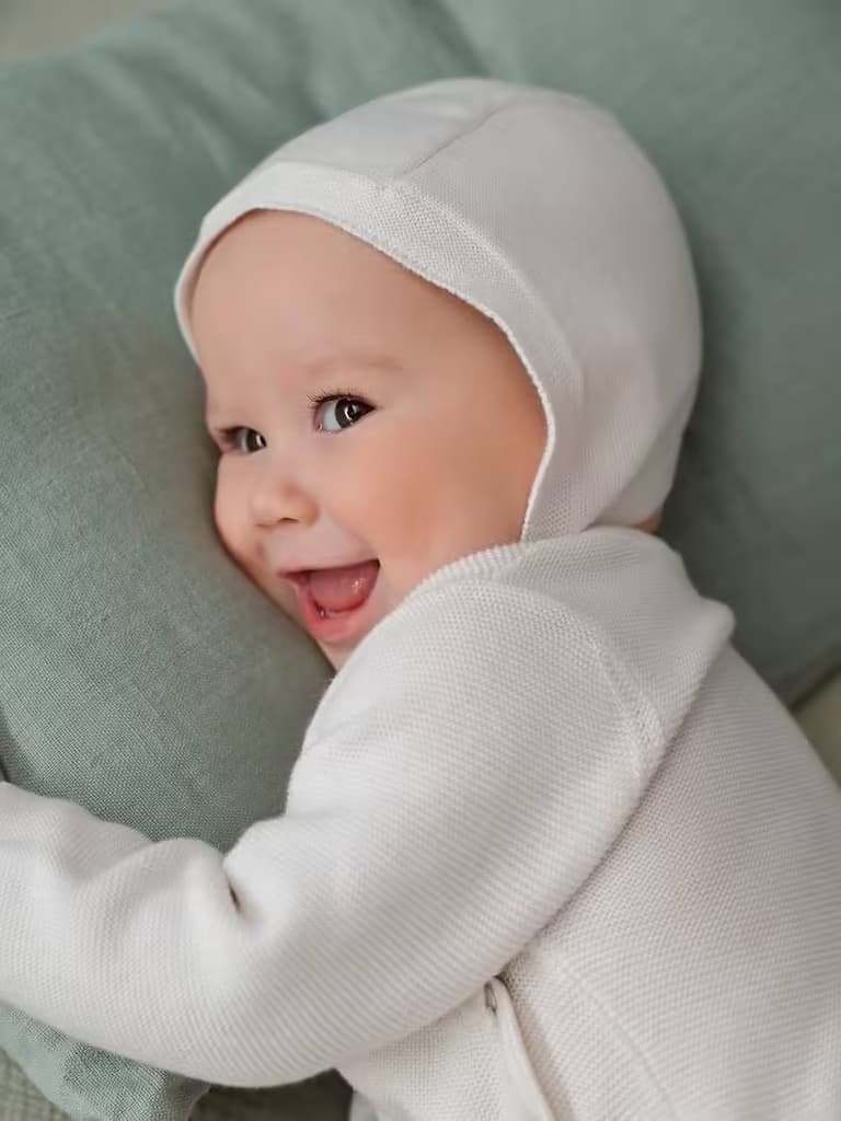 Tenue blanche de naissance pour bébé