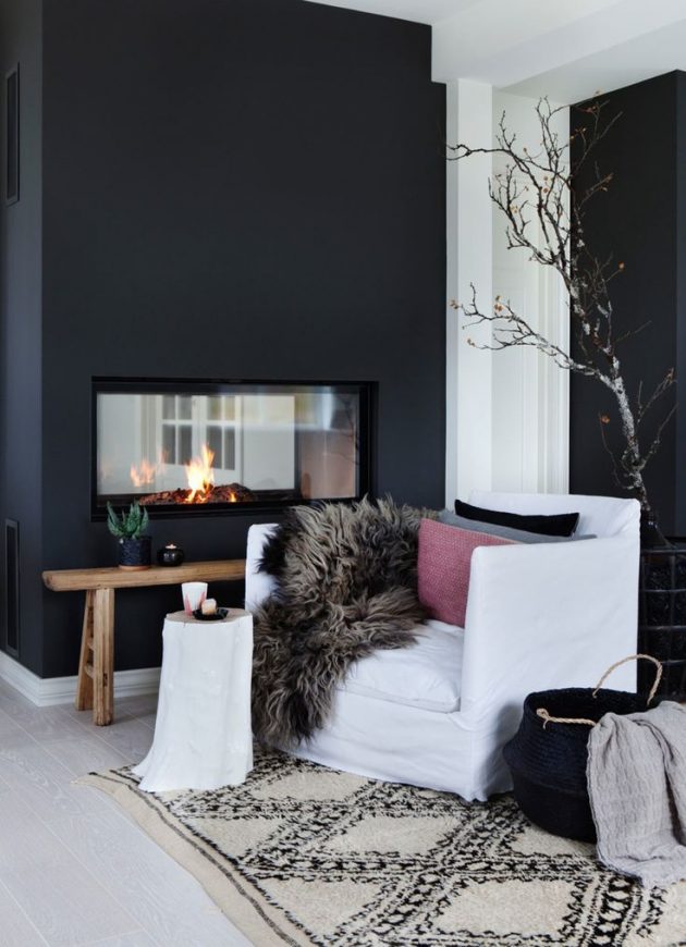 salon scandinave en noir et blanc mur cheminée