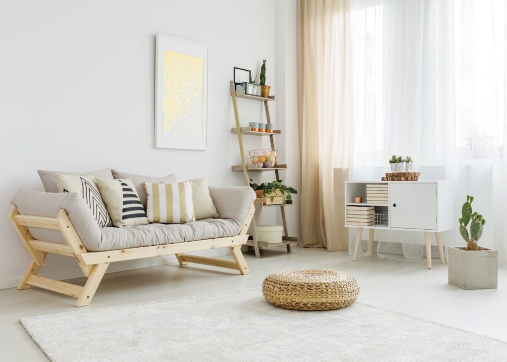 salon blanc épuré lumineux coussin de sol rotin tendance déco scandicraft clemaroundthecorner