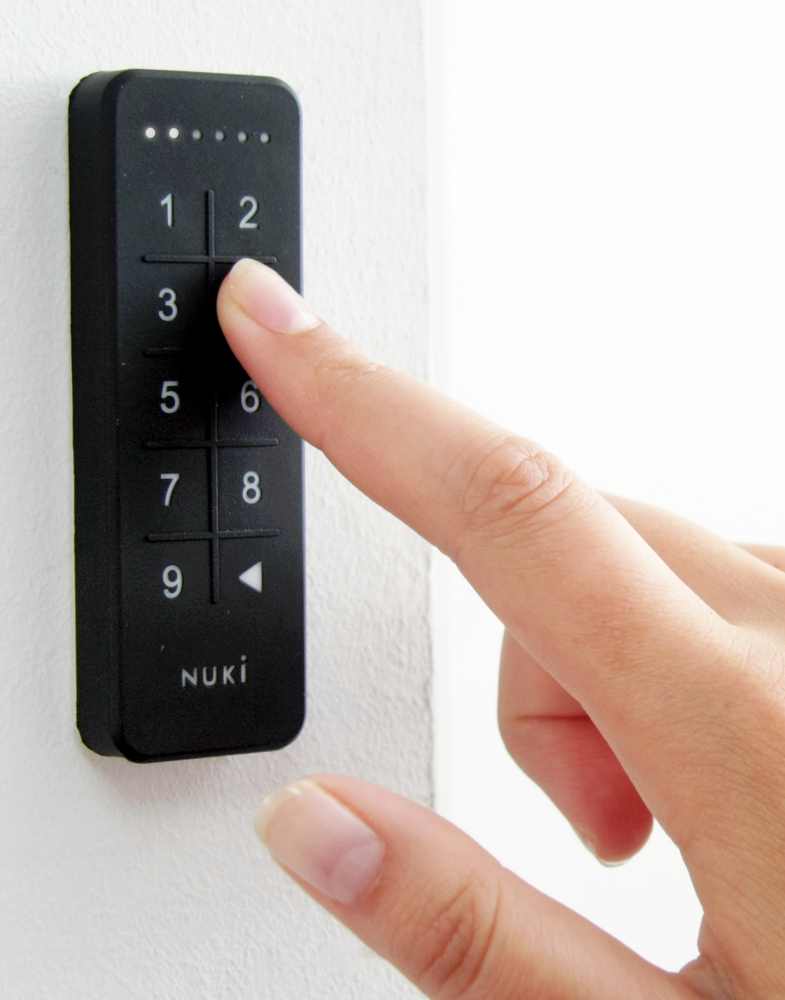 télécommande digicode appartement porte entrée connectée ouverture automatique sans clef