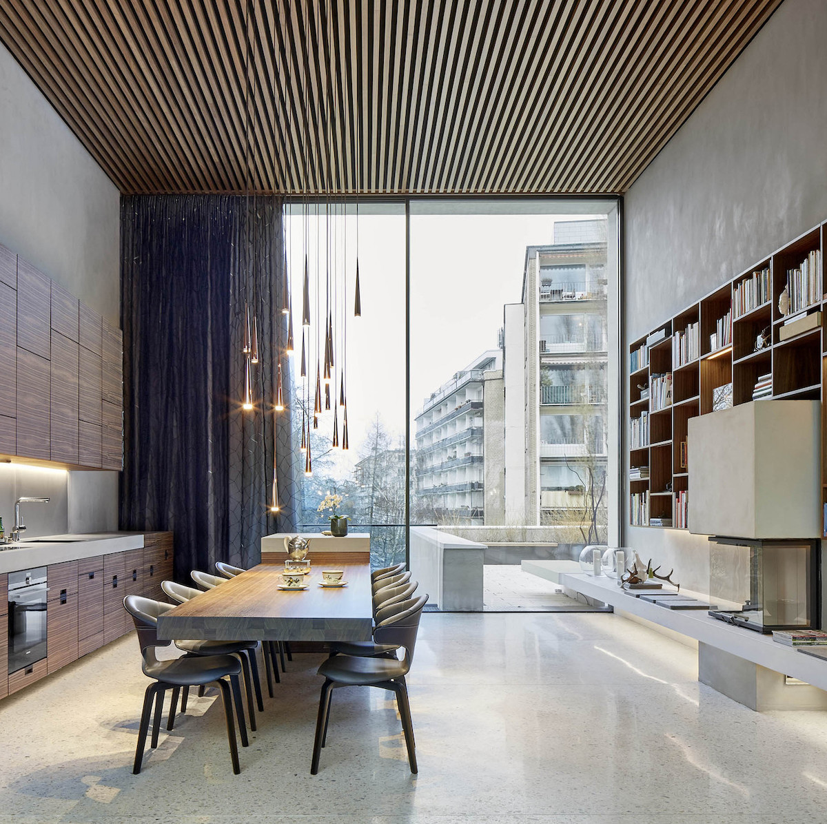 salle à mange cuisine appartement luxueux spacieux bois marbre baie vitrée