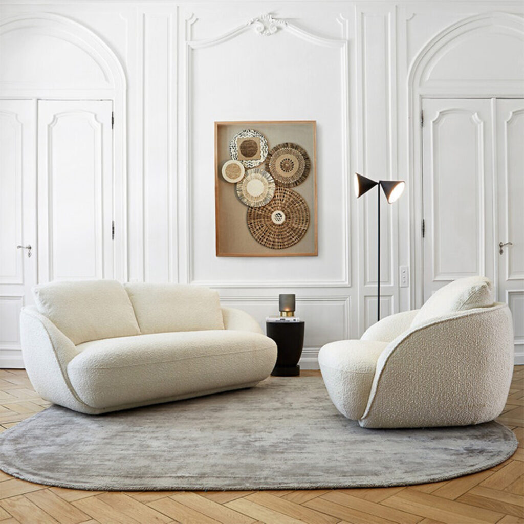 canapé arrondi tapis rond oval salon mise en valeur aménagement intérieur