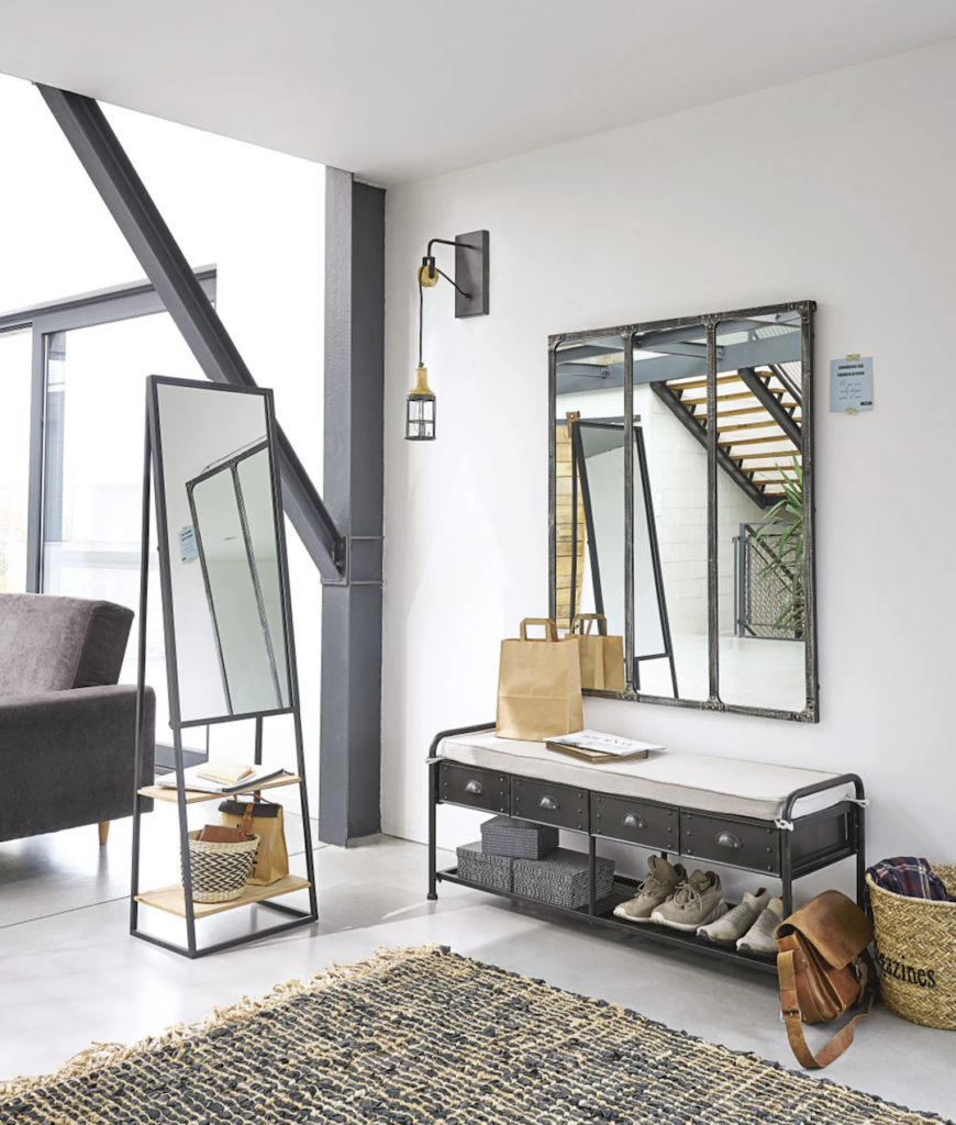 salon hall d'entrée miroir rangement tapis noir beige