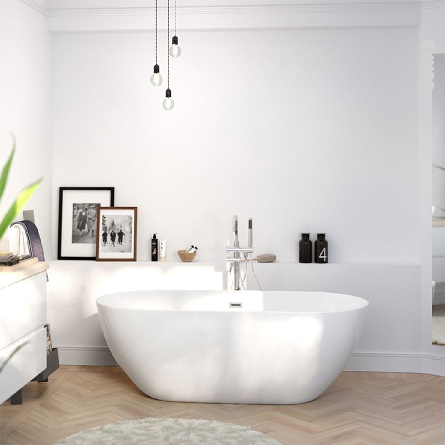 salle de bain baignoire ovale ronde deco douce épurée blanche parquet chevron