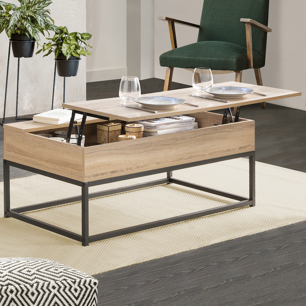 table basse bois finition metal gris plateau amovible tapis beige fauteuil vert