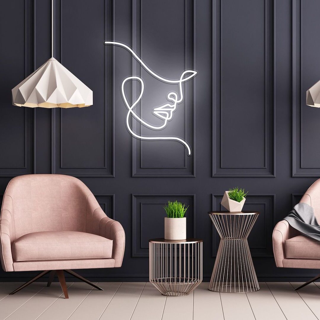 salon moderne design salon fauteuil rose pastel mur gris suspension blanche deisgn