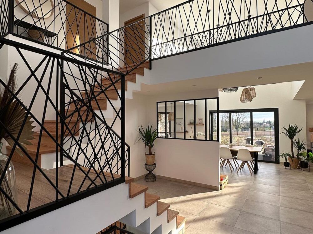 maison architecte design metal noir baie vitree