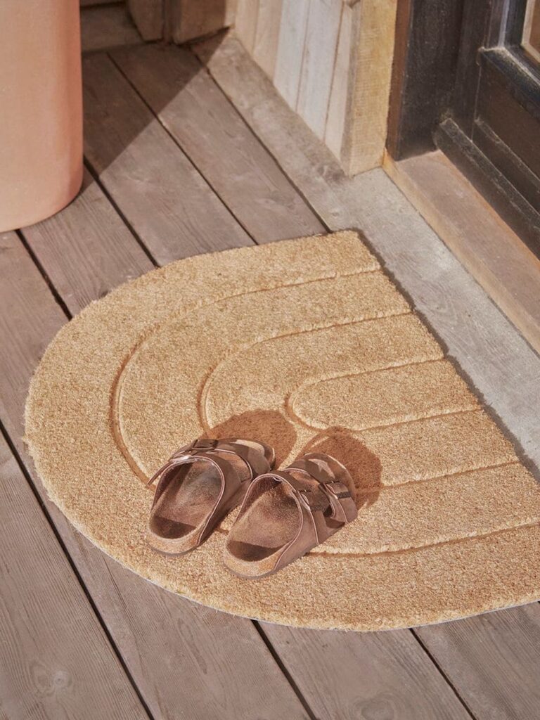 paillasson marron arrondie entree maison
