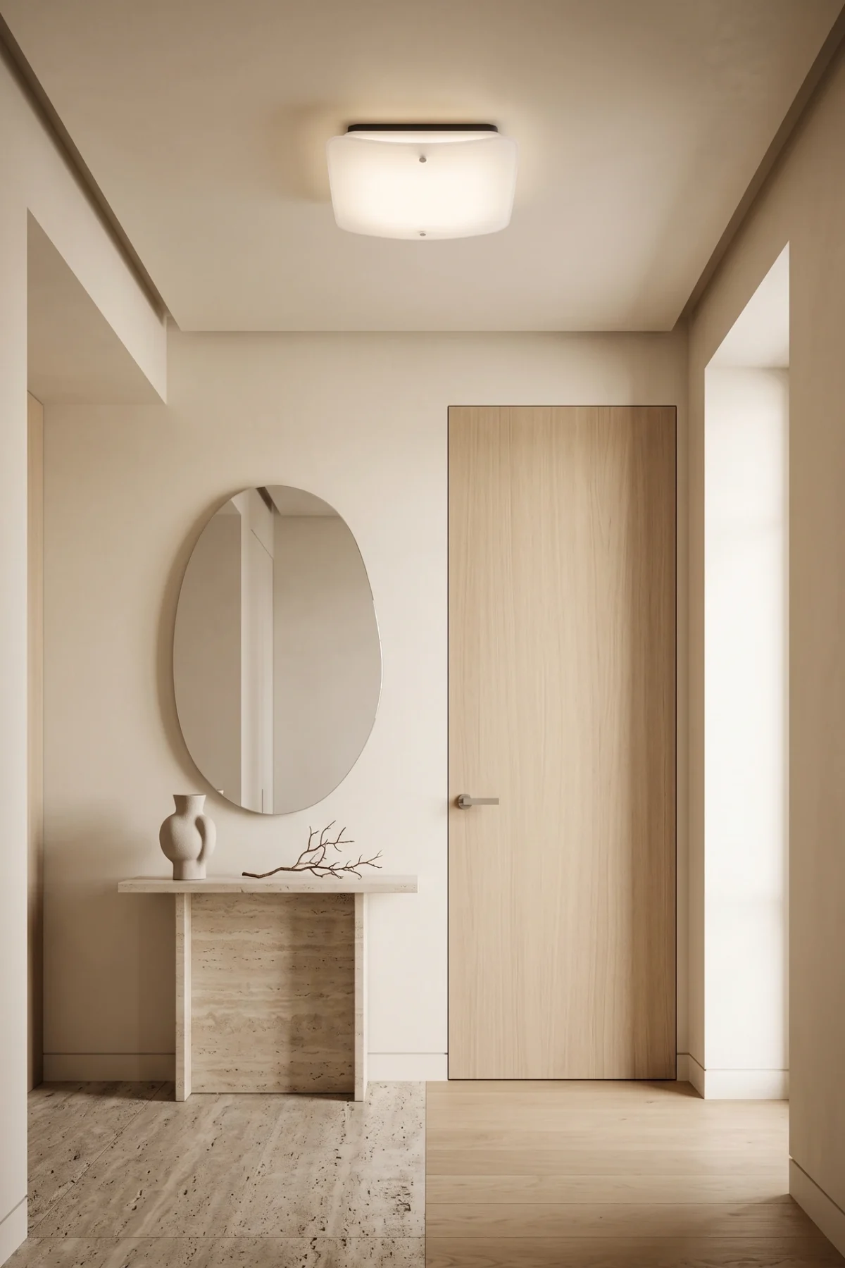 Entrée d'appartement contemporaine éclairée par le plafonnier Celine en verre sablé